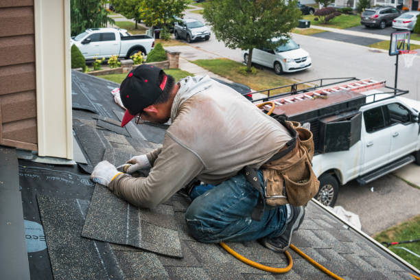 Professional Gutter Installation technician working in Warwick, MD